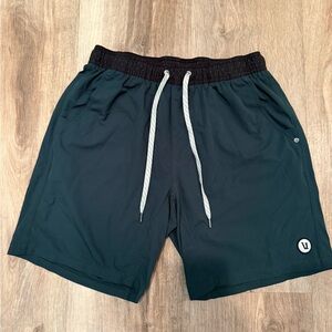 Vuori Men's Athletic Shorts in Dark Green and Black